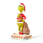 Enesco Jim Shore Grinch With Presents Eating Gingerbread Figurine, 8"